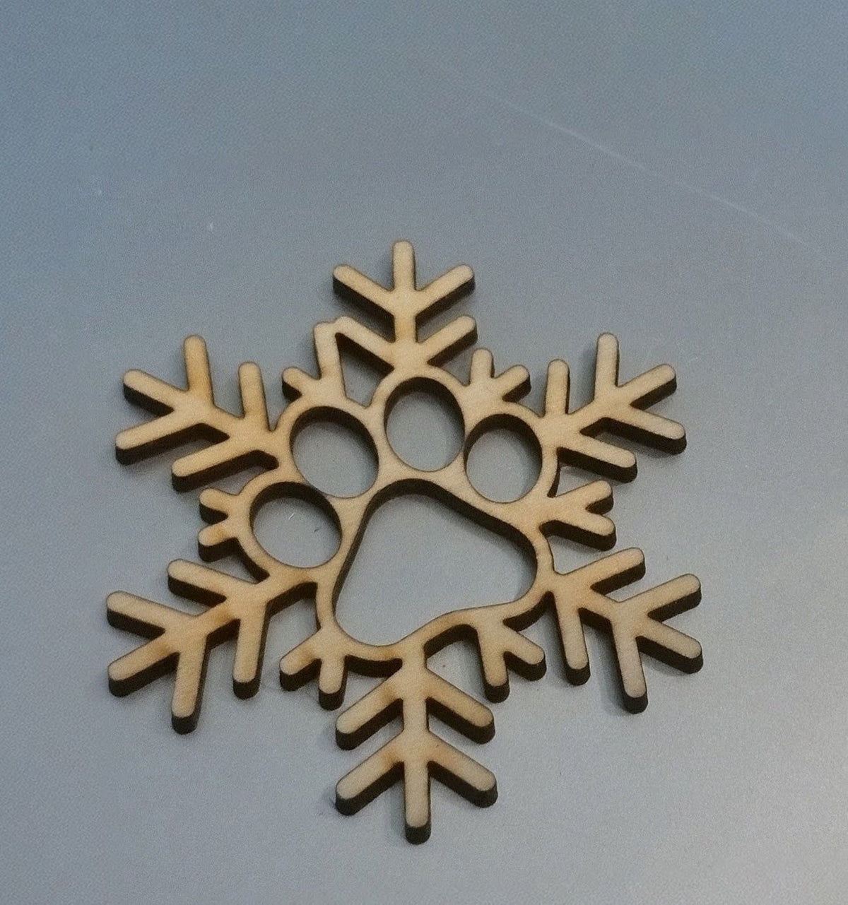 Flocon de neige en bois - Empreinte de patte